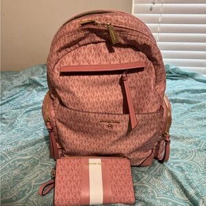 Large Michael kors purse and wallet set.